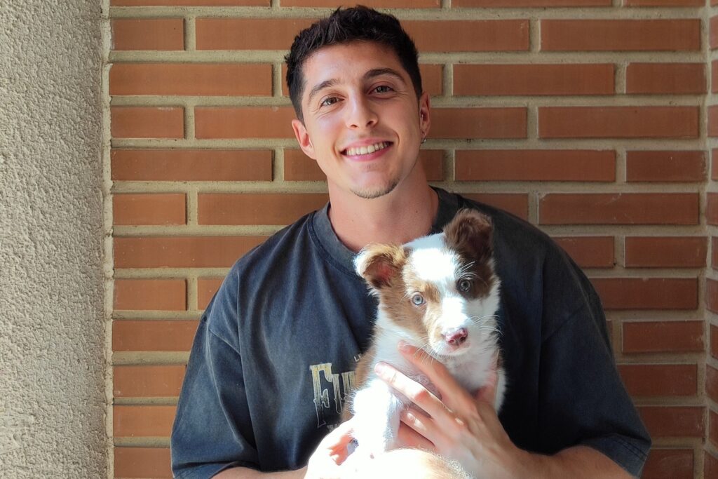 David con Loki cachorro border collie en brazos